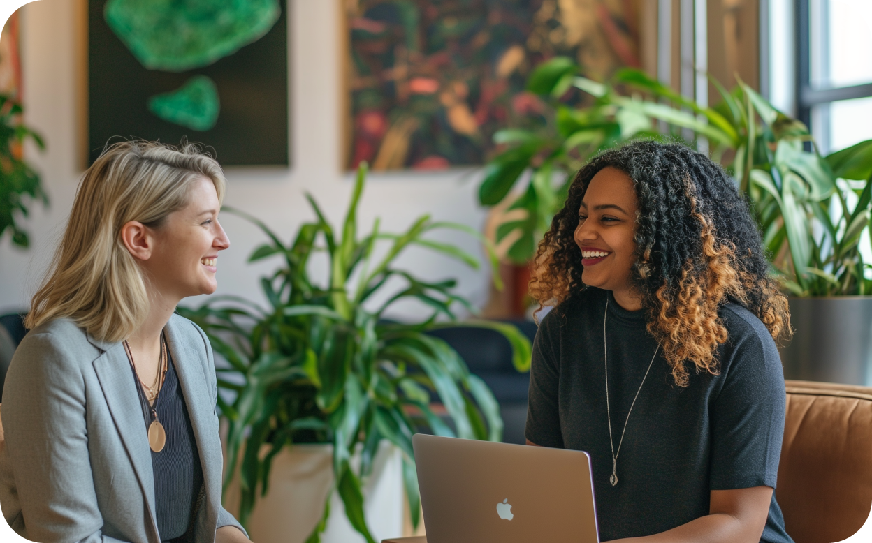 Recruiter and Candidate smiling during an interview